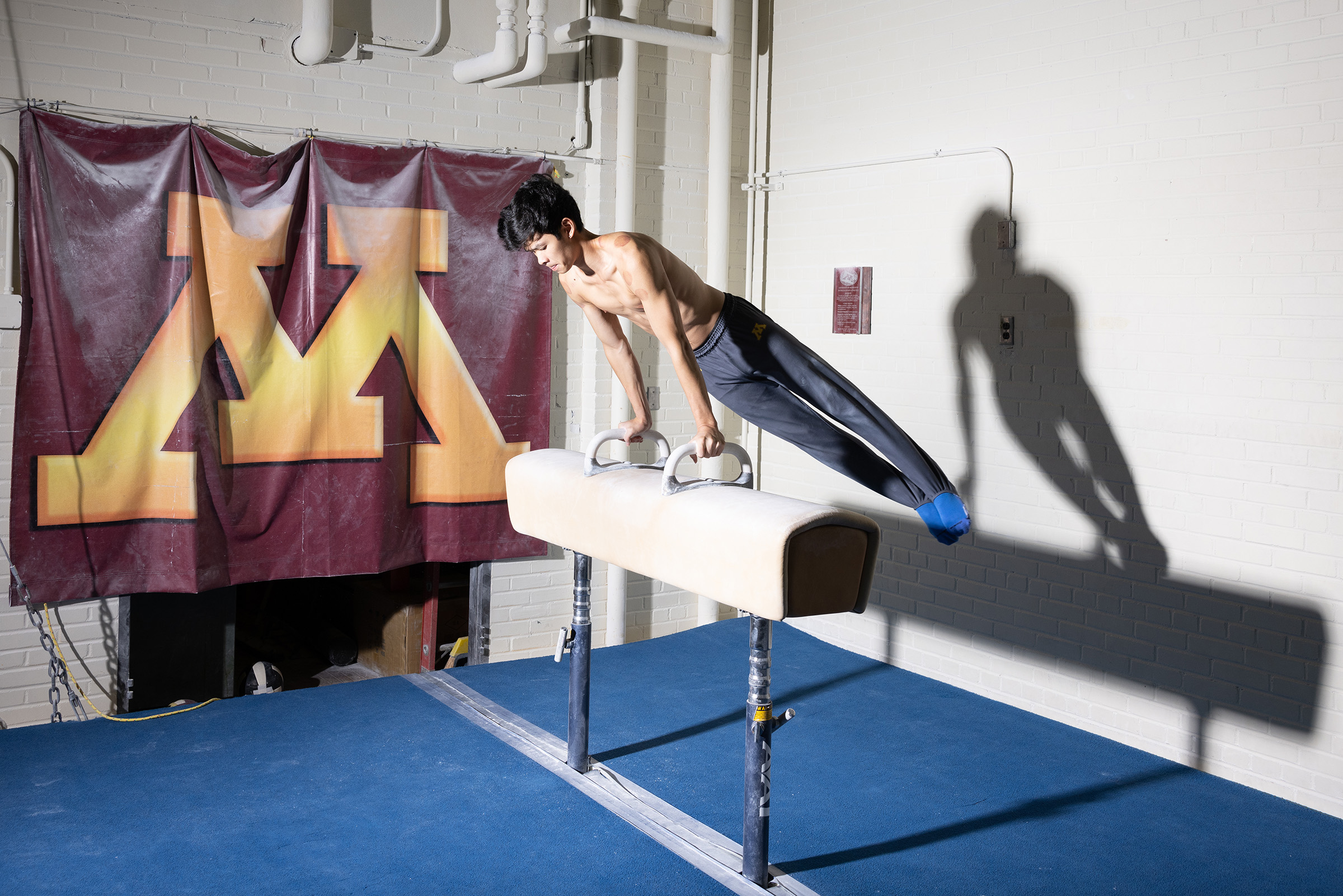 Evan Ng, talented gymnast soaring to new heights.