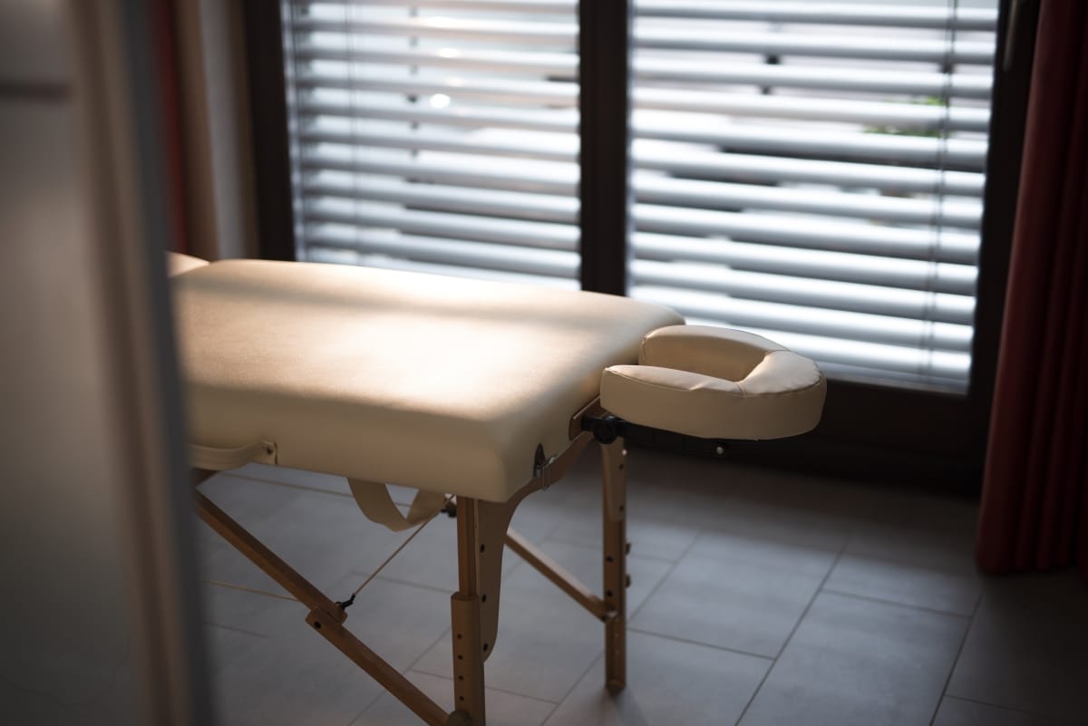 Relaxing massage experience with a cozy massage table