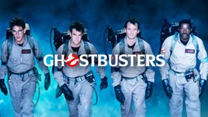 Ghostbusters standing behind movie title