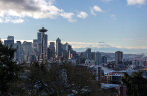 The Space Needle stands over the Seattle skyline as Mt. Rainier is seen in the background on March 13, 2022 in Seattle, Washington.