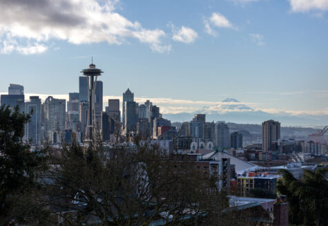 The Space Needle stands over the Seattle skyline as Mt. Rainier is seen in the background on March 13, 2022 in Seattle, Washington.