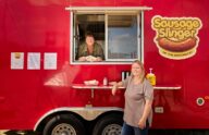 Heather Kratt and Holly Manzano with their food truck, Sausage Slingers of the Midwest. Photography Credit: Rick Wenner.