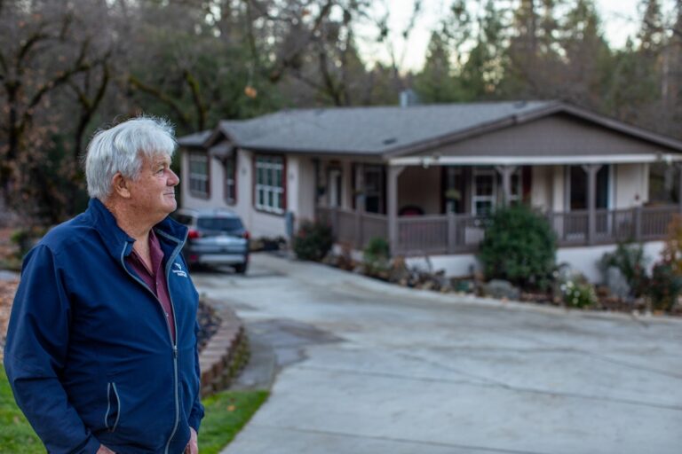An image of PLF client George Sheetz standing outside of his home.